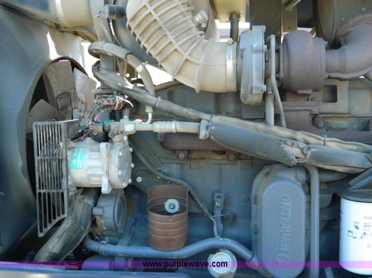 image for item E4189 2000 New Holland TV-140 bi-directional 4WD tractor