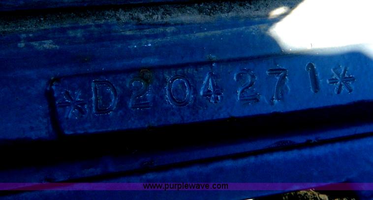 image for item E4189 2000 New Holland TV-140 bi-directional 4WD tractor