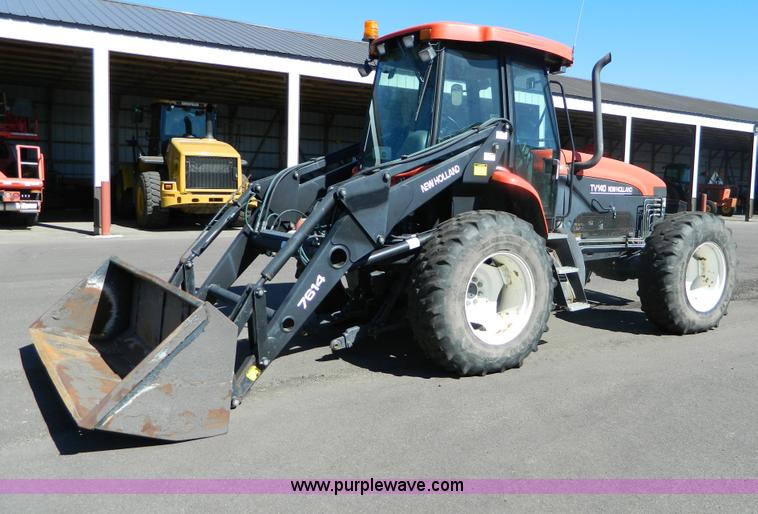 image for item E4190 2000 New Holland TV-140 bi-directional 4WD tractor