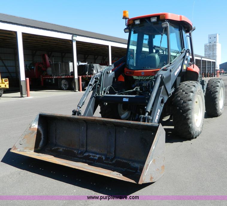 image for item E4190 2000 New Holland TV-140 bi-directional 4WD tractor