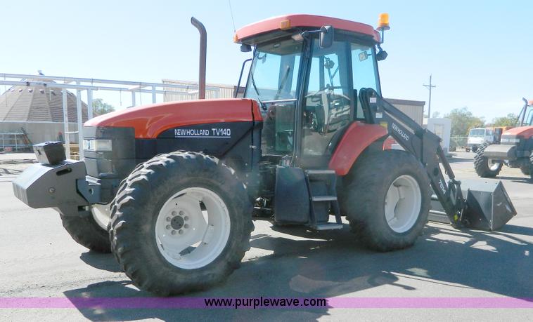 image for item E4190 2000 New Holland TV-140 bi-directional 4WD tractor