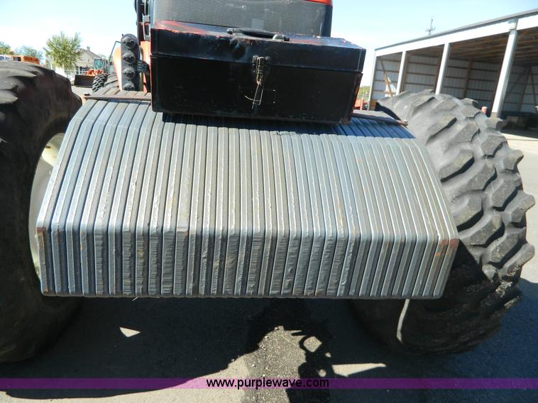 image for item E4190 2000 New Holland TV-140 bi-directional 4WD tractor