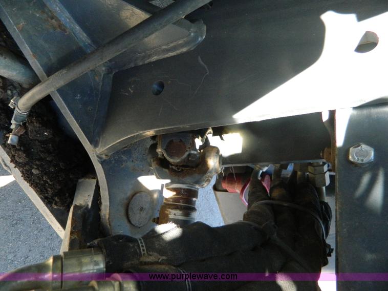 image for item E4190 2000 New Holland TV-140 bi-directional 4WD tractor