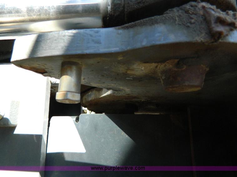 image for item E4190 2000 New Holland TV-140 bi-directional 4WD tractor