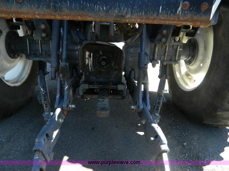 image for item E4190 2000 New Holland TV-140 bi-directional 4WD tractor