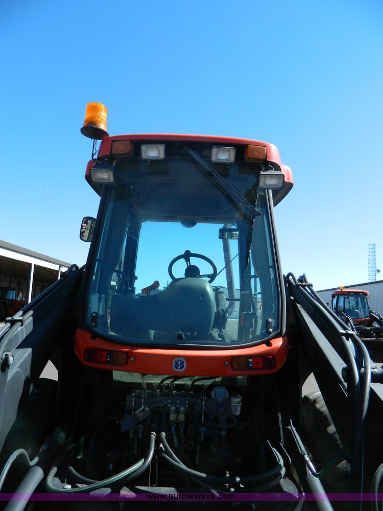 image for item E4190 2000 New Holland TV-140 bi-directional 4WD tractor