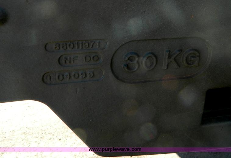 image for item E4190 2000 New Holland TV-140 bi-directional 4WD tractor