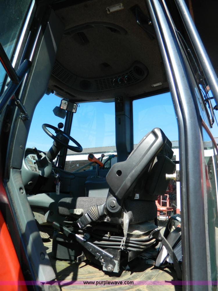 image for item E4190 2000 New Holland TV-140 bi-directional 4WD tractor