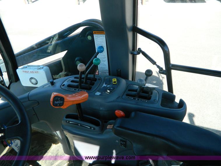 image for item E4190 2000 New Holland TV-140 bi-directional 4WD tractor