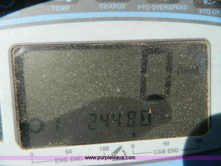 image for item E4190 2000 New Holland TV-140 bi-directional 4WD tractor