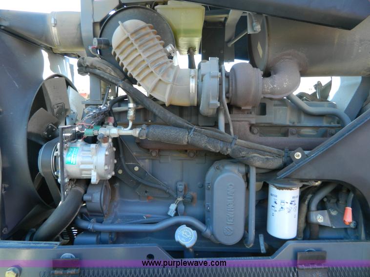 image for item E4190 2000 New Holland TV-140 bi-directional 4WD tractor