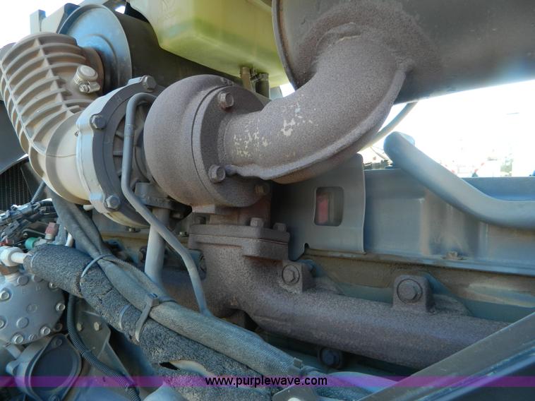 image for item E4190 2000 New Holland TV-140 bi-directional 4WD tractor