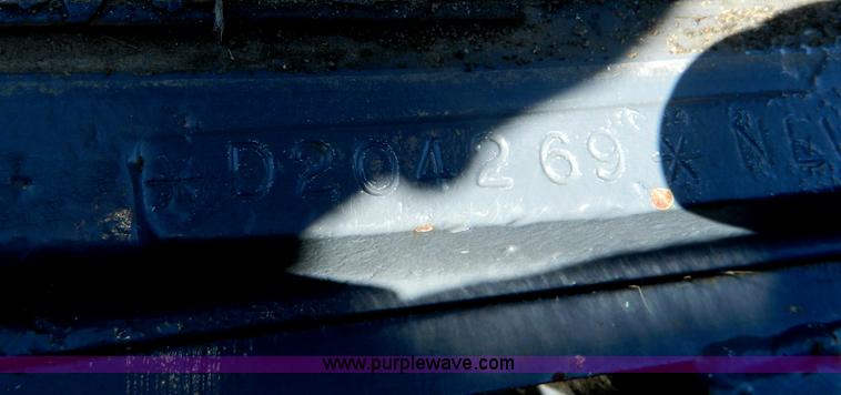 image for item E4190 2000 New Holland TV-140 bi-directional 4WD tractor