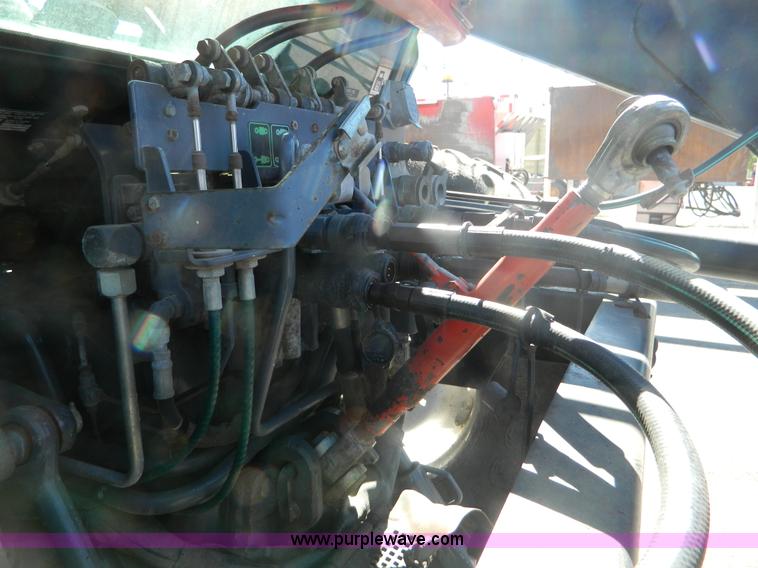 image for item E4191 2000 New Holland TV-140 tractor