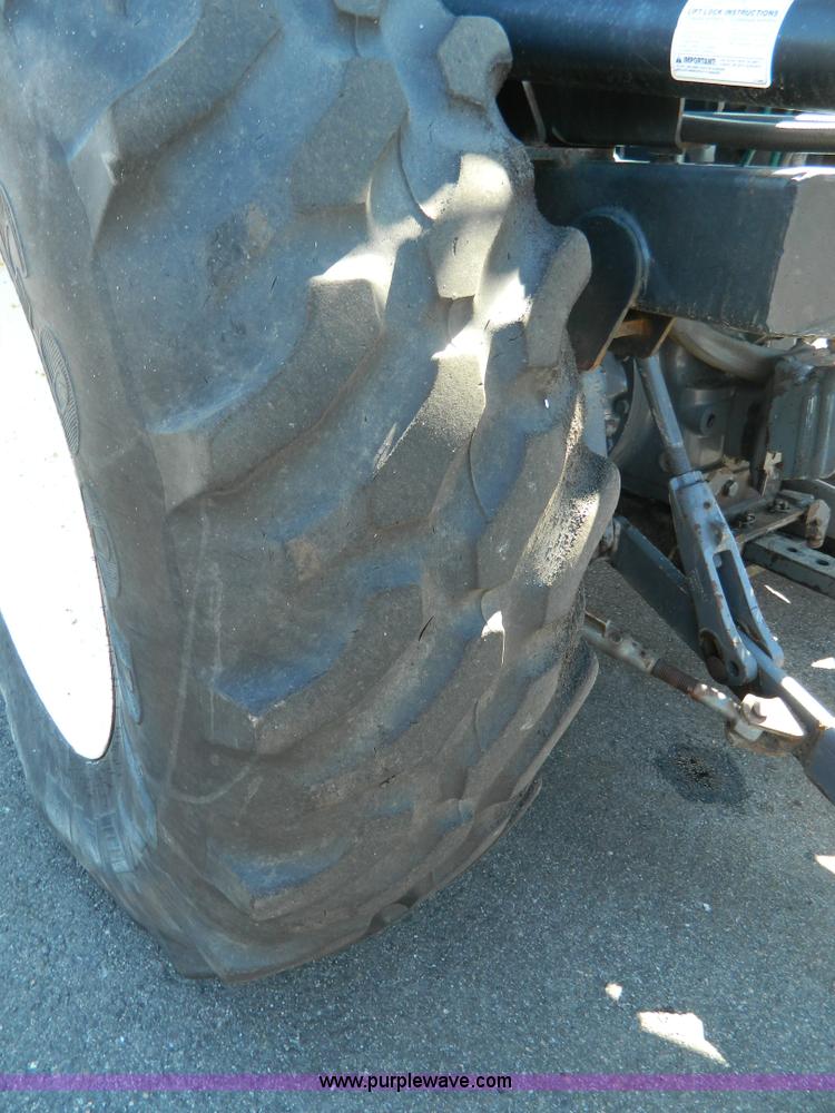 image for item E4191 2000 New Holland TV-140 tractor