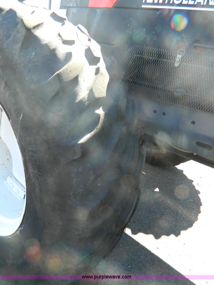 image for item E4191 2000 New Holland TV-140 tractor