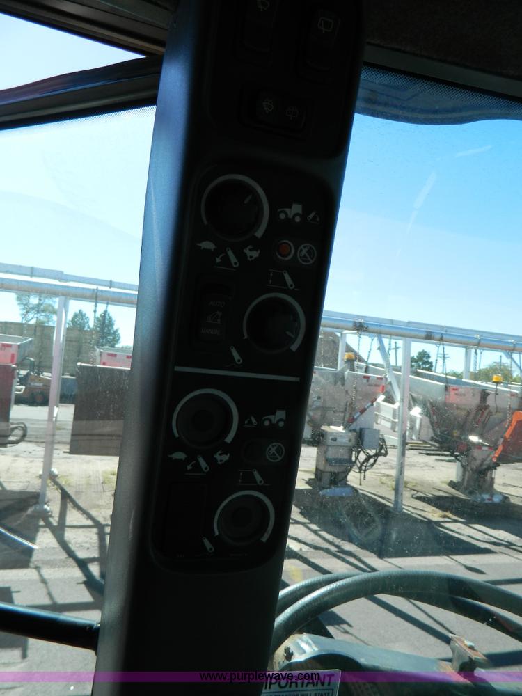 image for item E4191 2000 New Holland TV-140 tractor