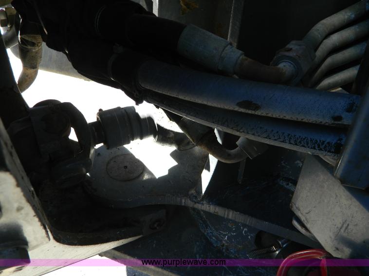 image for item E4191 2000 New Holland TV-140 tractor