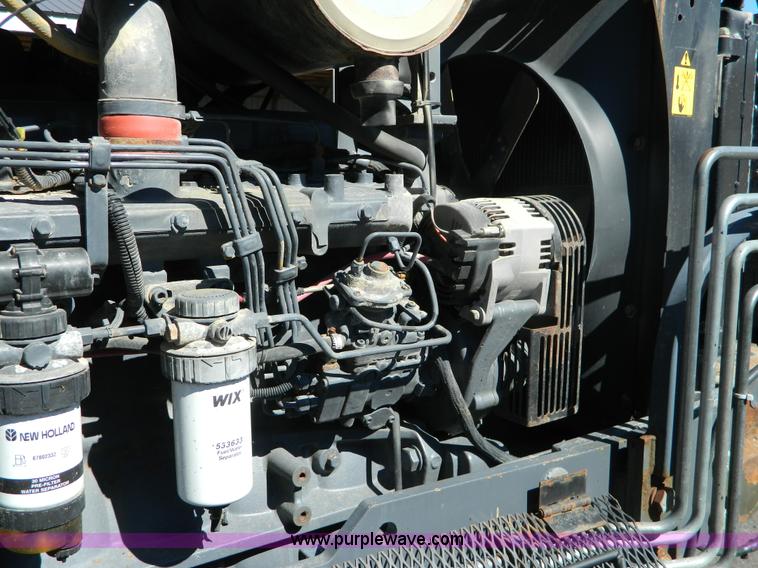 image for item E4191 2000 New Holland TV-140 tractor