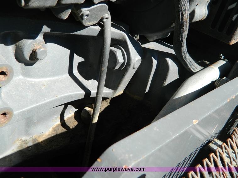 image for item E4191 2000 New Holland TV-140 tractor