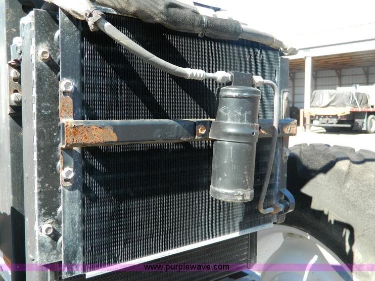 image for item E4191 2000 New Holland TV-140 tractor