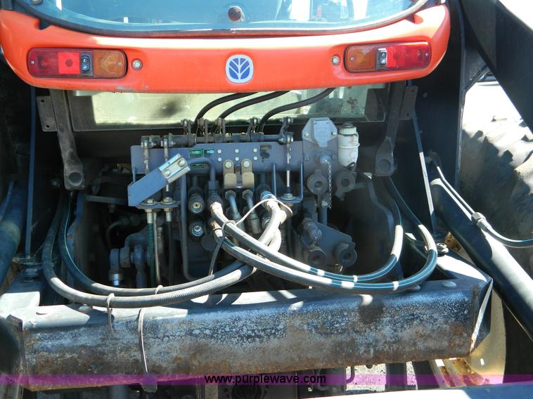 image for item E4192 2000 New Holland TV-140 tractor