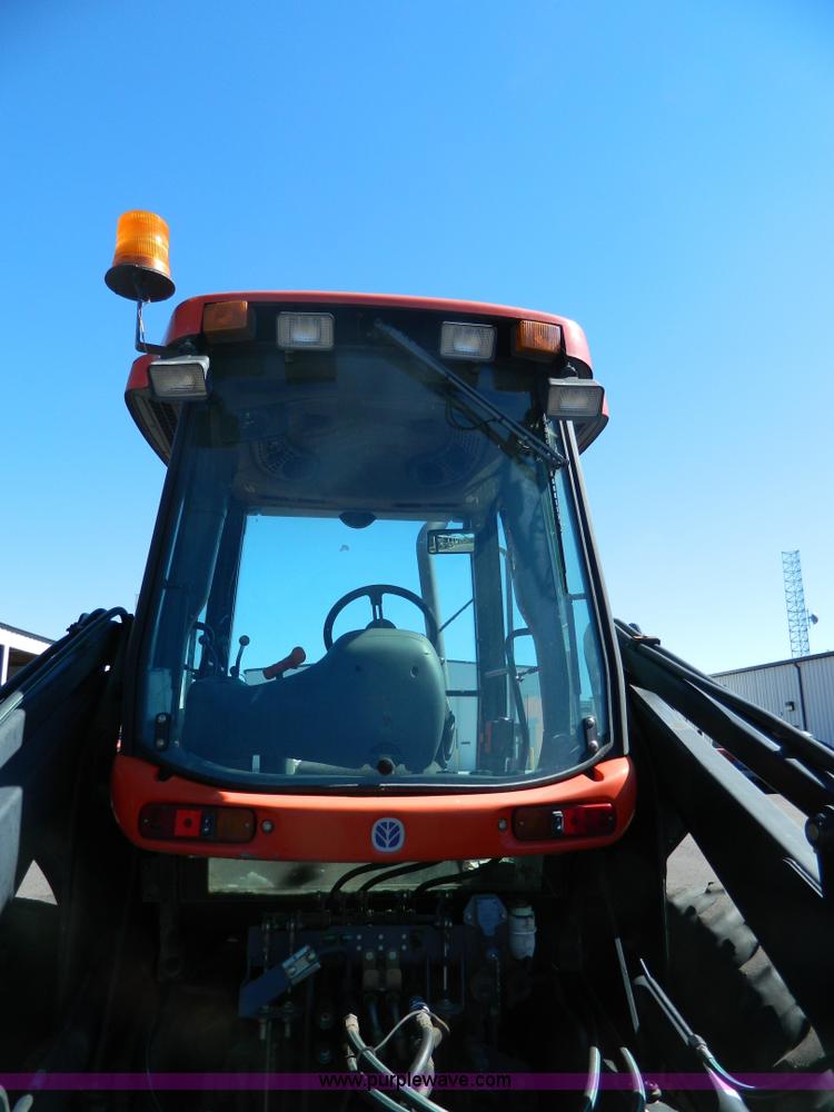 image for item E4192 2000 New Holland TV-140 tractor