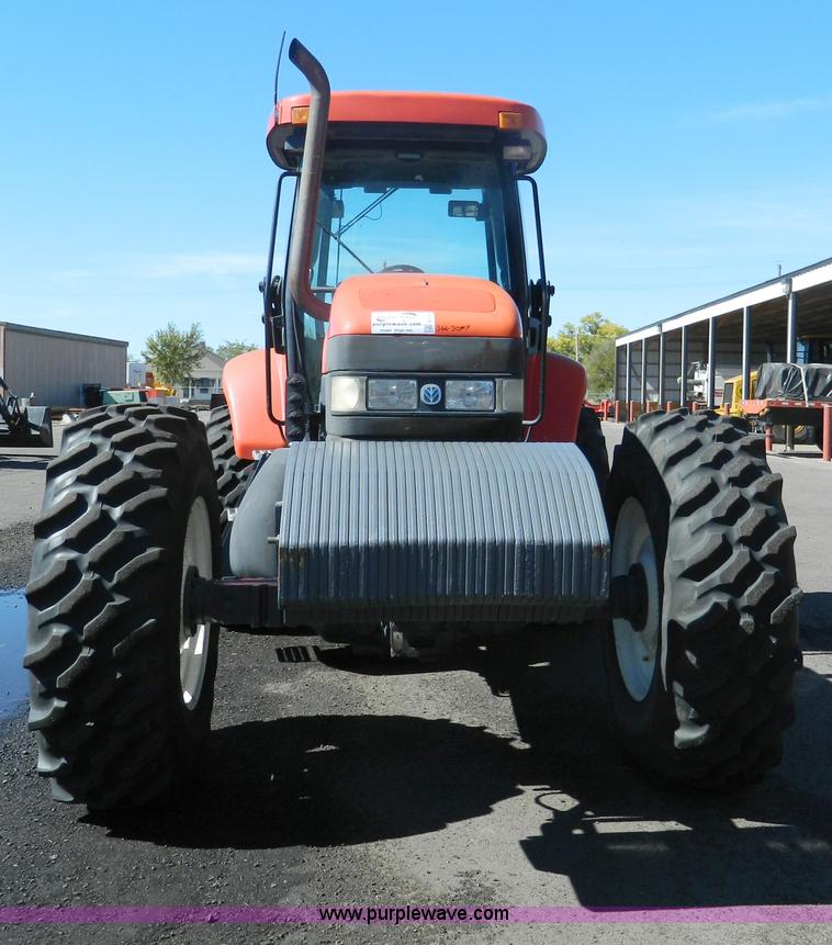 image for item E4192 2000 New Holland TV-140 tractor