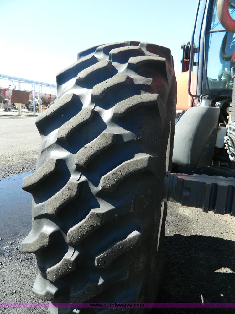 image for item E4192 2000 New Holland TV-140 tractor