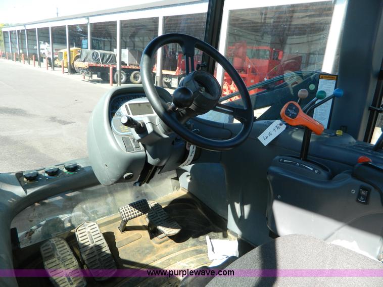 image for item E4192 2000 New Holland TV-140 tractor