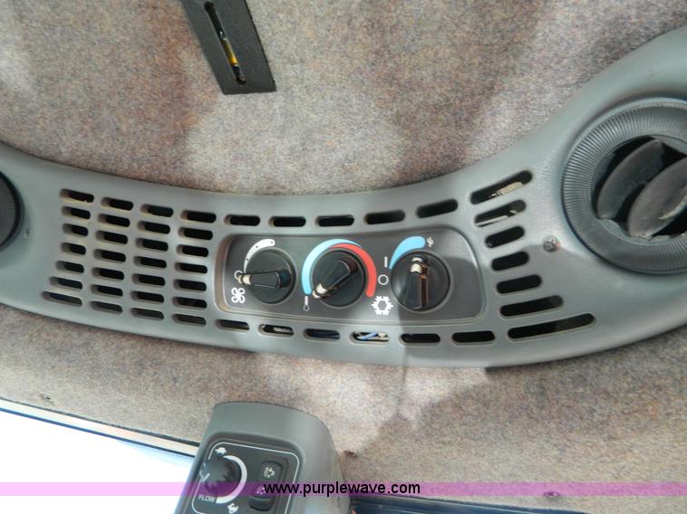 image for item E4192 2000 New Holland TV-140 tractor