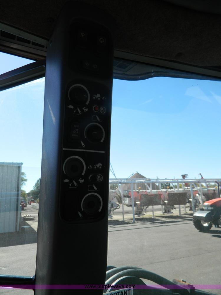 image for item E4192 2000 New Holland TV-140 tractor