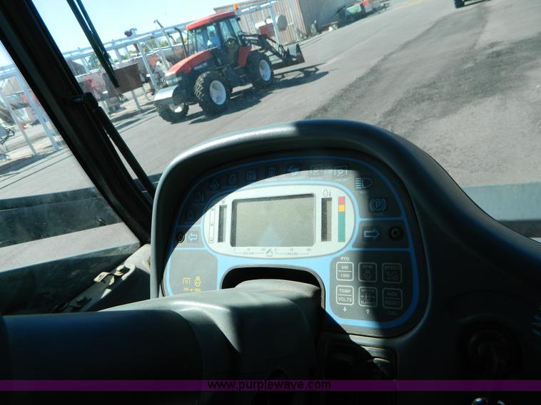 image for item E4192 2000 New Holland TV-140 tractor