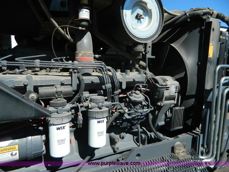 image for item E4192 2000 New Holland TV-140 tractor