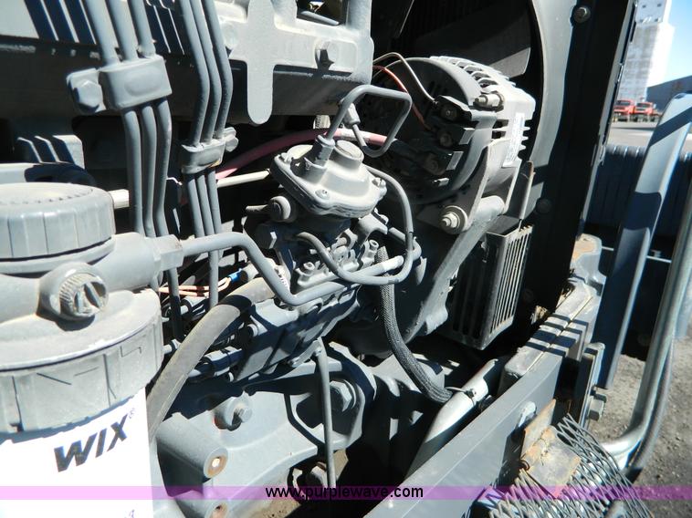 image for item E4192 2000 New Holland TV-140 tractor