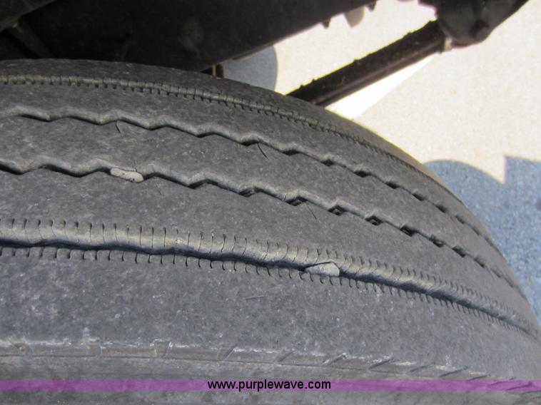 image for item E8054 2002 Freightliner FL60 oil distributor truck