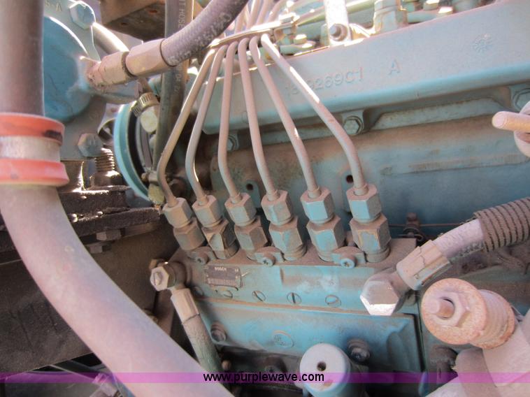 image for item E8060 1993 International 4900 stake bed truck