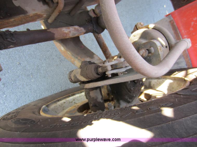 image for item E8060 1993 International 4900 stake bed truck