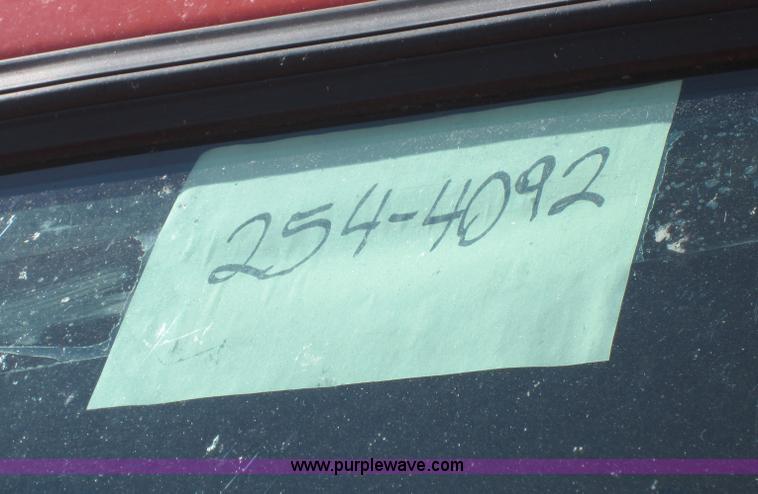 image for item E8060 1993 International 4900 stake bed truck