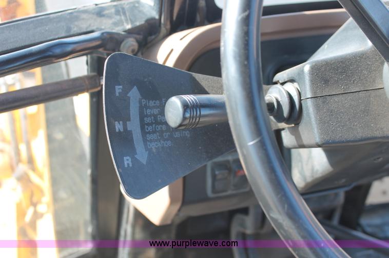 image for item F6142 1997 John Deere 310E backhoe