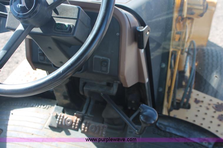 image for item F6142 1997 John Deere 310E backhoe