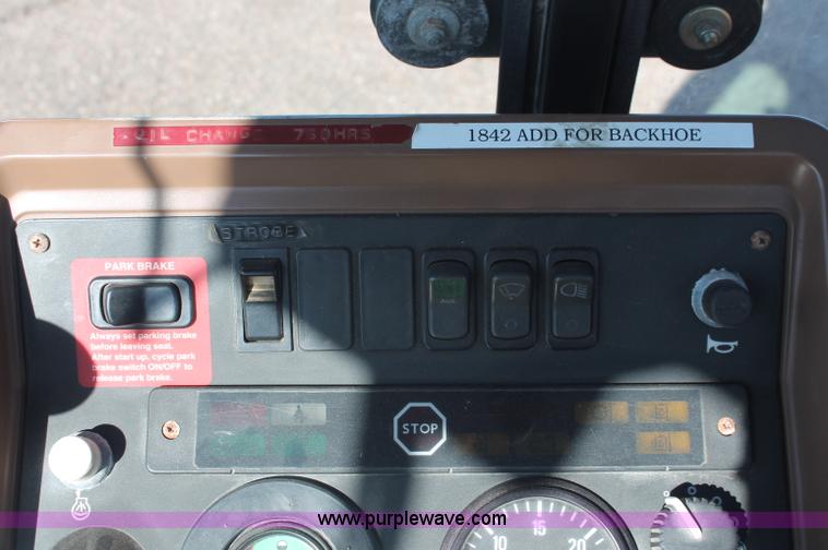 image for item F6142 1997 John Deere 310E backhoe