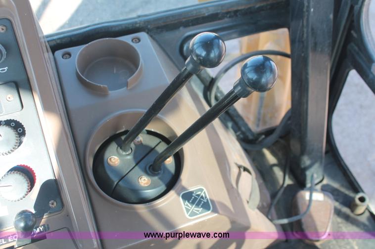 image for item F6142 1997 John Deere 310E backhoe