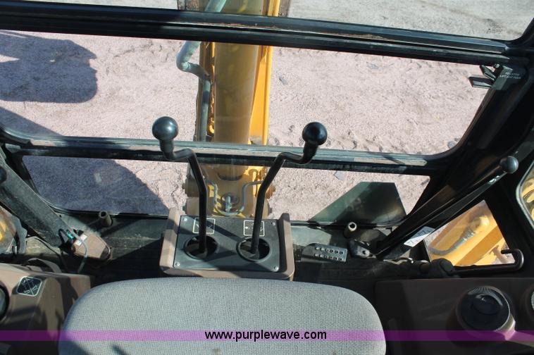 image for item F6142 1997 John Deere 310E backhoe