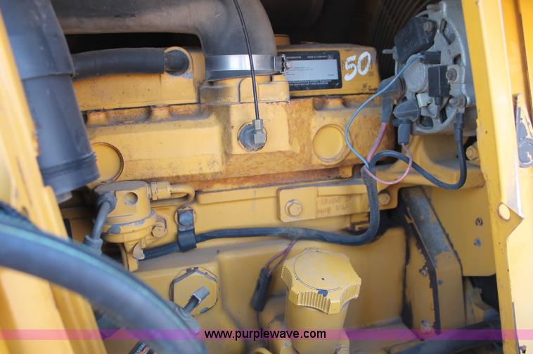 image for item F6142 1997 John Deere 310E backhoe