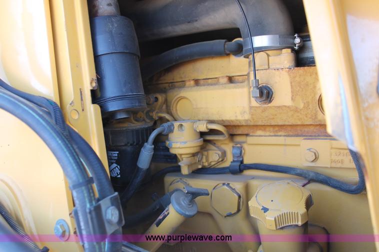 image for item F6142 1997 John Deere 310E backhoe