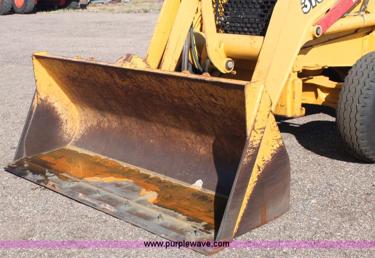 image for item F6142 1997 John Deere 310E backhoe