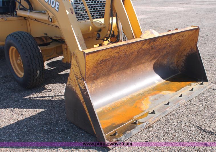 image for item F6142 1997 John Deere 310E backhoe