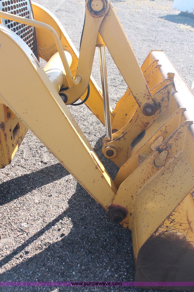 image for item F6142 1997 John Deere 310E backhoe