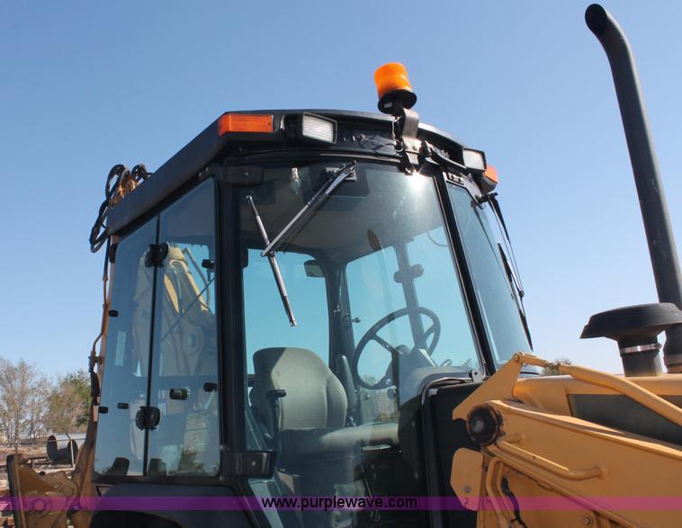 image for item F6142 1997 John Deere 310E backhoe